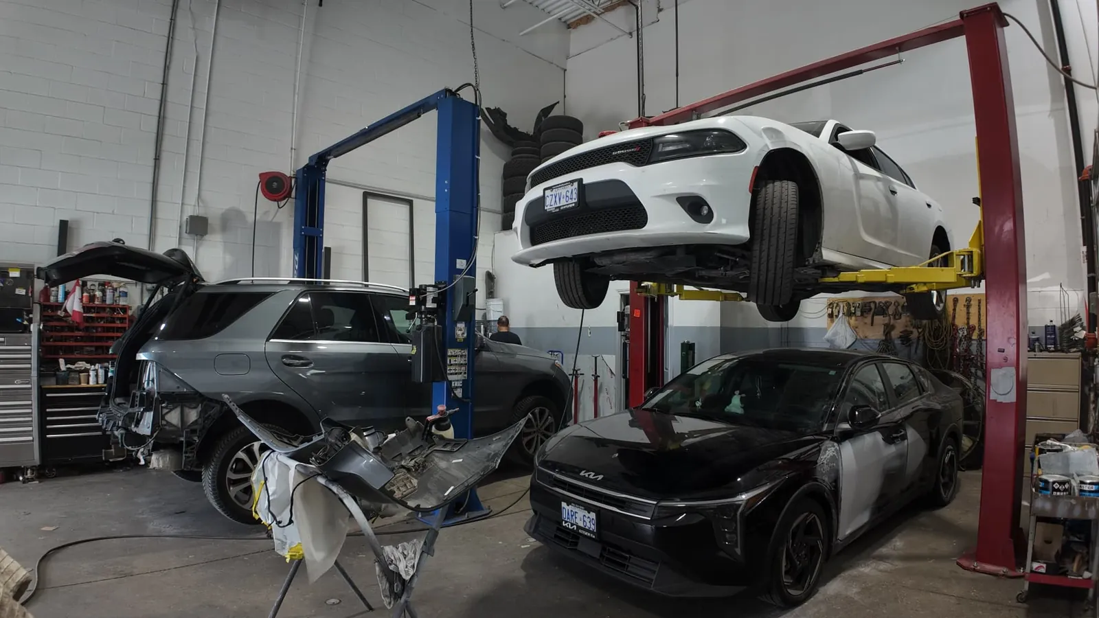 Sultan Motors auto repair and collision shop in Brampton with vehicles on hoists